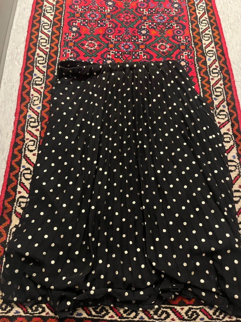 Black and gold polka dot midi skirt